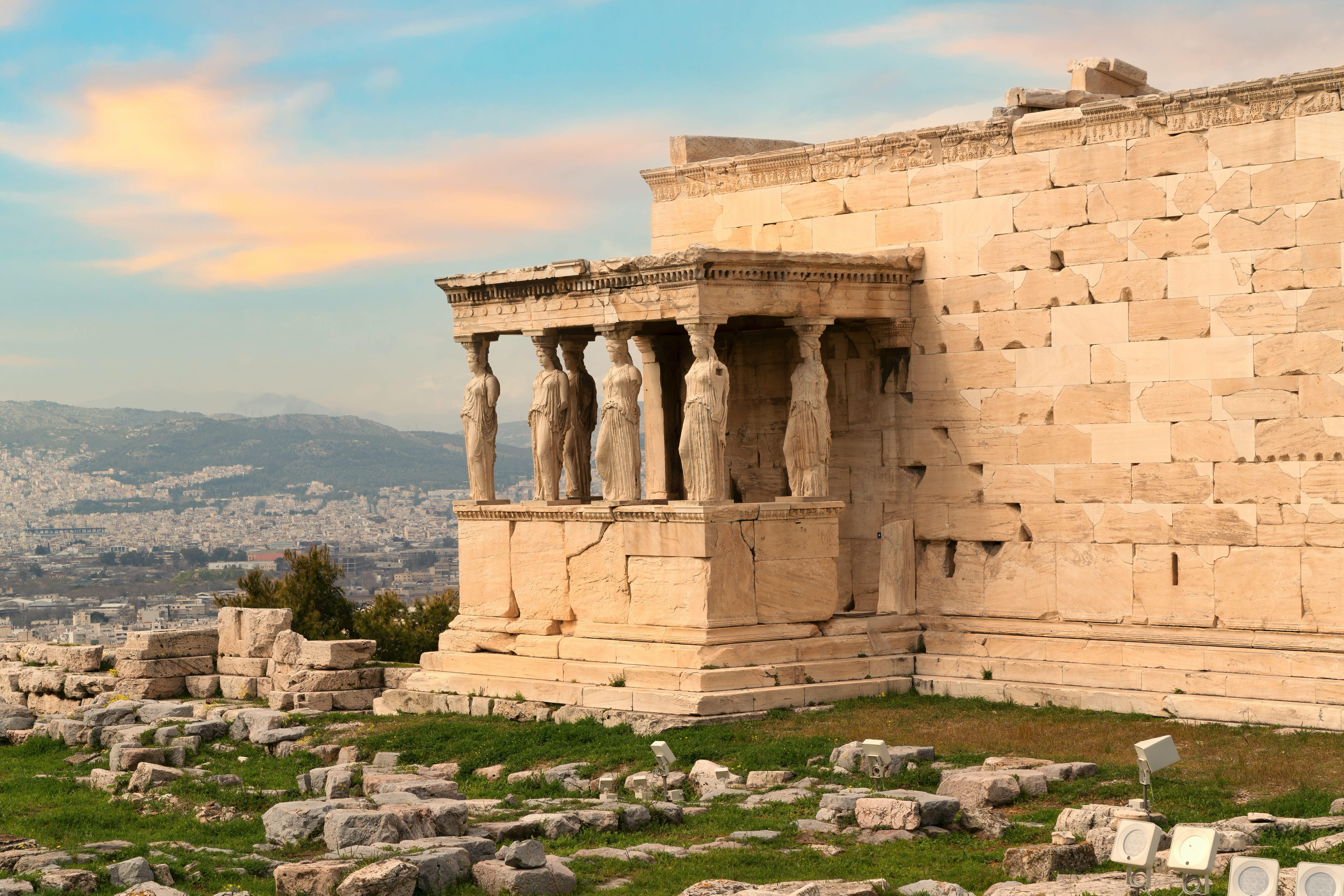 Erechtheion Temple (or Erechtheum) with the figures of Caryatids at the archaeological site of Acropolis in Athens, Greece at sunset. It was dedicated to both Athena and Poseidon. Golden soft light; Shutterstock ID 2144514097; your: Erin Lenczycki; gl: 65050; netsuite: Digital; full: Digital
2144514097