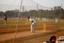 Boys from the Chanawala A. Sport Academy practice cricket at Azad Maidan.