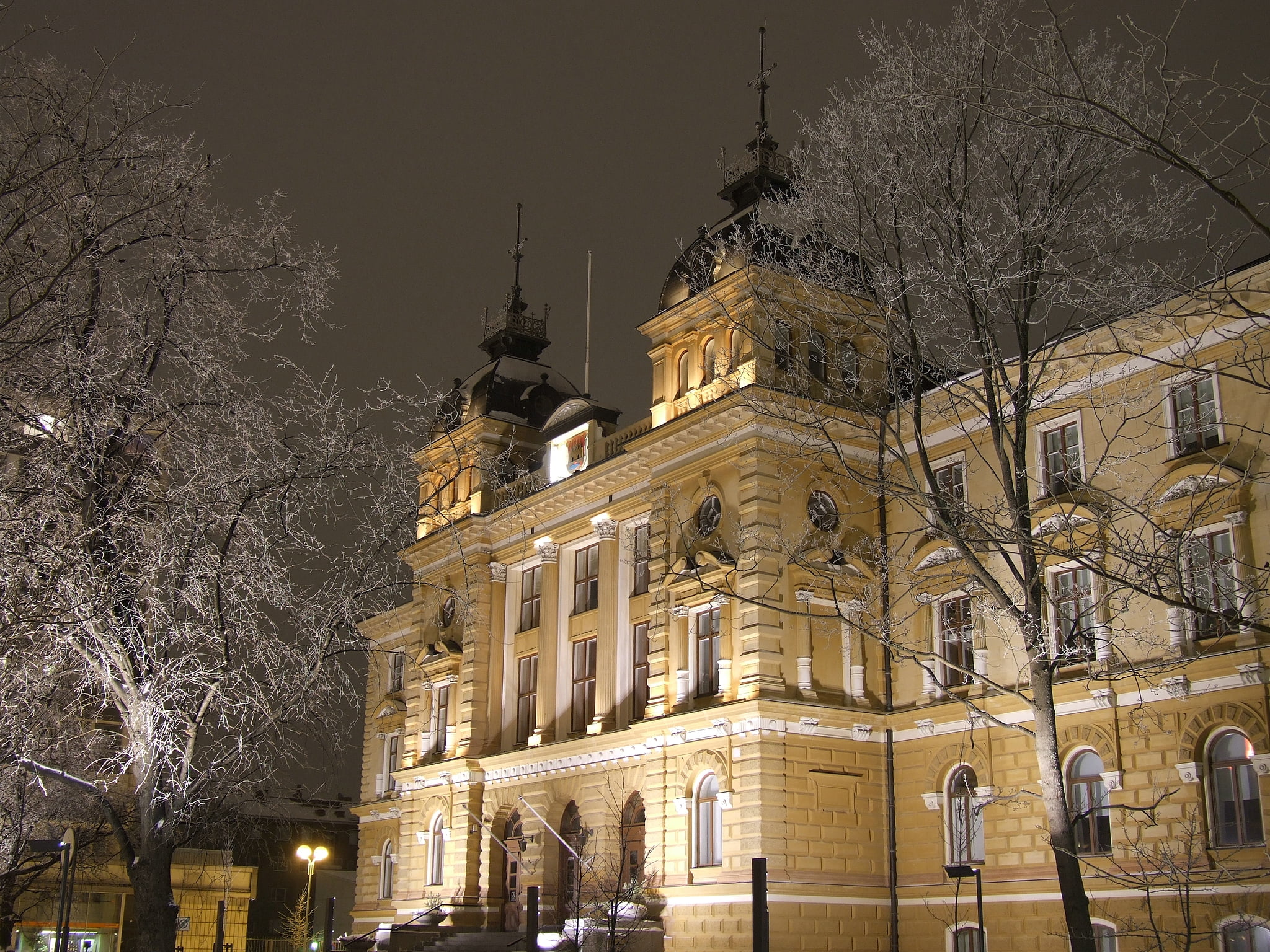 Oulu - The Oulu City Hall in Oulu, Finland, in the evening. The City Hall was designed by Swedish architect J.E.Stenberg in 1885. Weather: −5 °C. Oulu - The Oulu City Hall in Oulu, Finland, in the evening. The City Hall was designed by Swedish architect J.E.Stenberg in 1885. Weather: −5 °C.