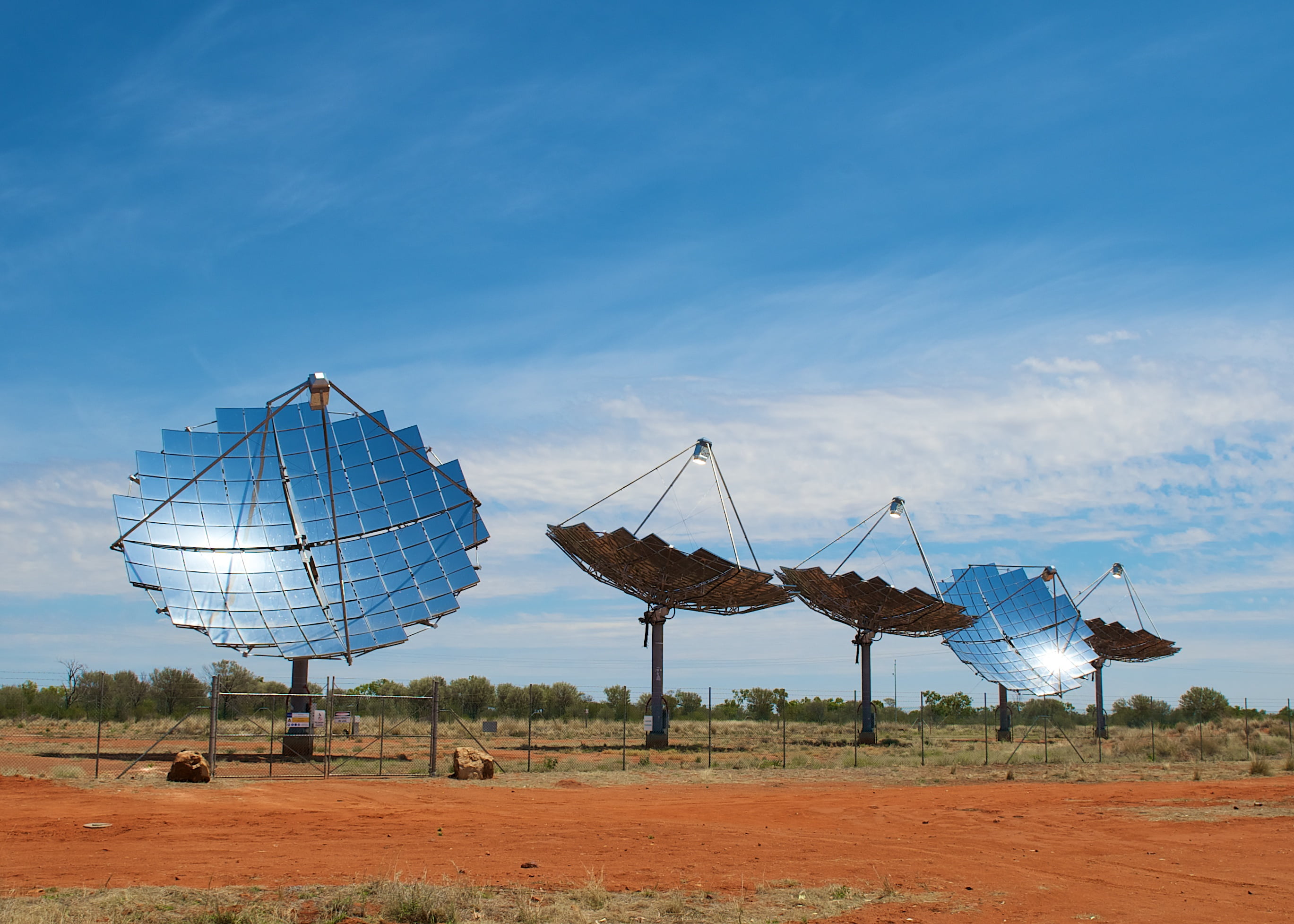 Windorah - Windorah's Solar Farm dishes taken from the roadside (Diamantina Developmental Road) on a hot summer day Windorah - Windorah's Solar Farm dishes taken from the roadside (Diamantina Developmental Road) on a hot summer day