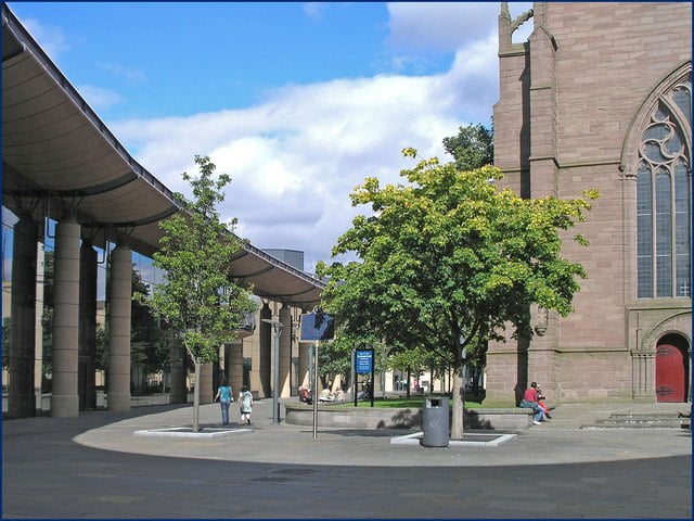 Dundee - The old steeple and the new overgate A very pleasant open area in the city centre. Dundee - The old steeple and the new overgate A very pleasant open area in the city centre.