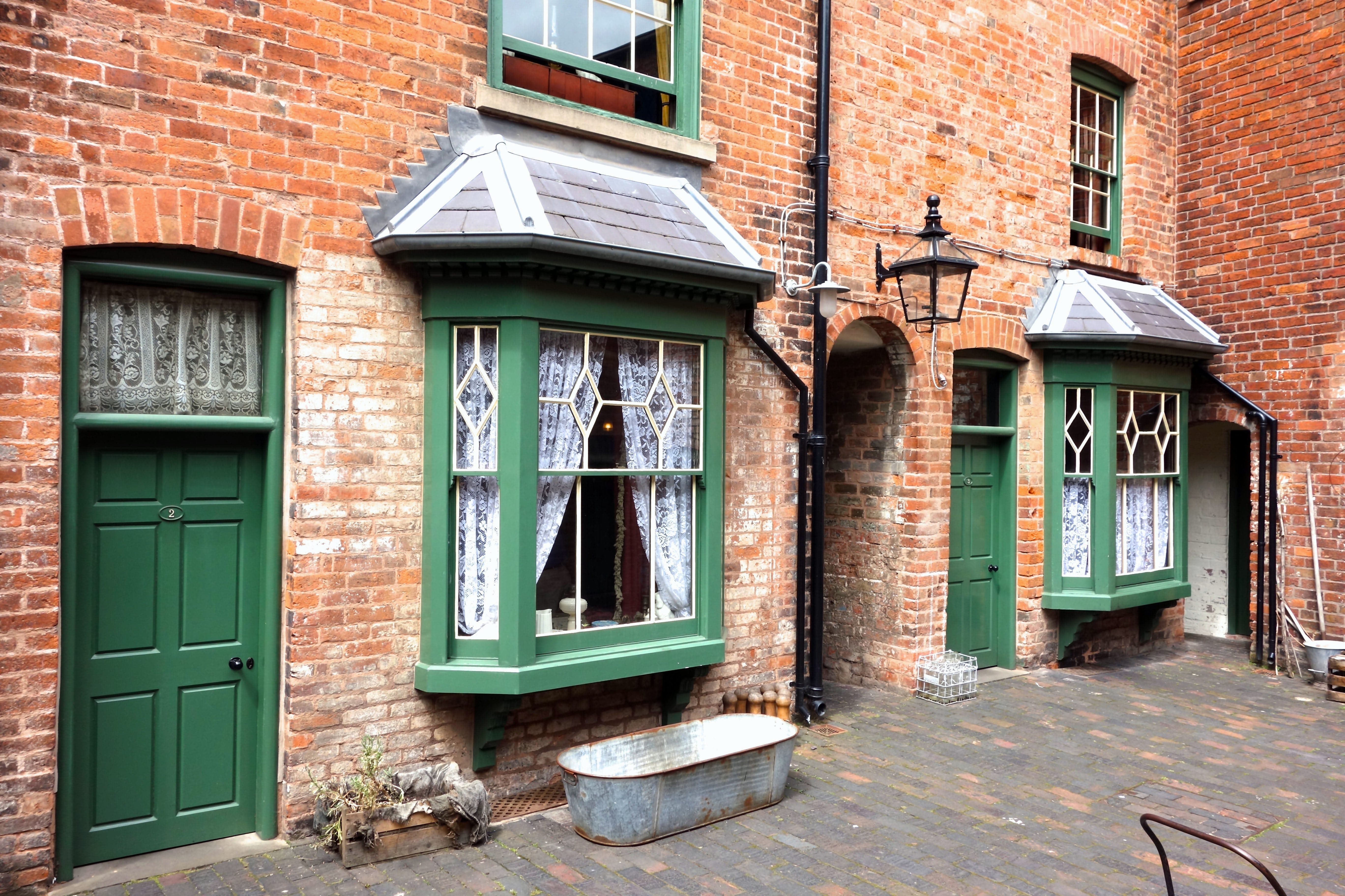 BIRMINGHAM, ENGLAND - JULY 4. The Birmingham Back-to-Backs are a block of Victorian dwellings which have been preserved and open to the public in the city centre. July 4 2016 in Birmingham, England.; Shutterstock ID 453993793; your: Bridget Brown; gl: 65050; netsuite: Online Editorial; full: POI Image Update